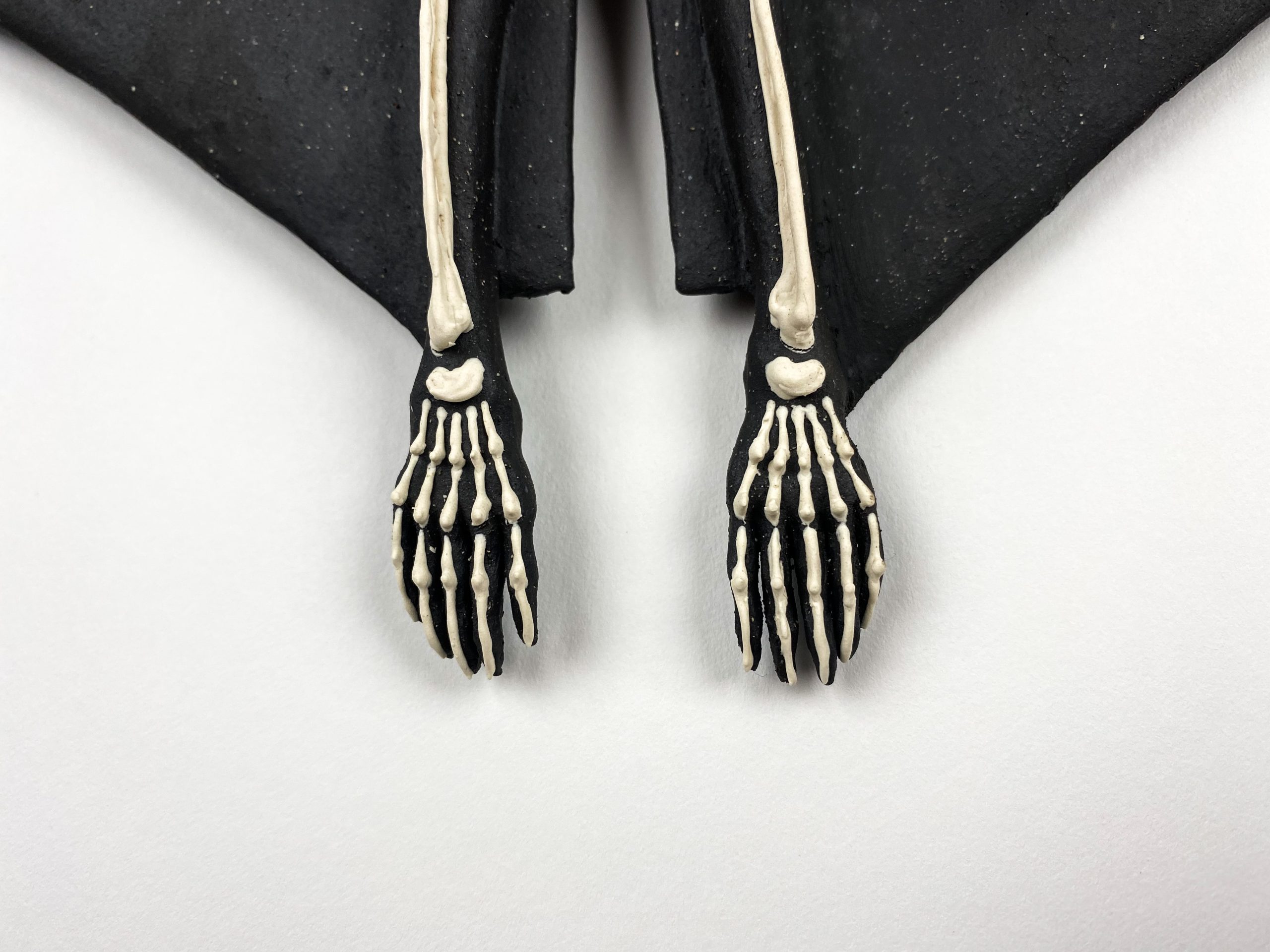 Medium: Black stoneware and white slip